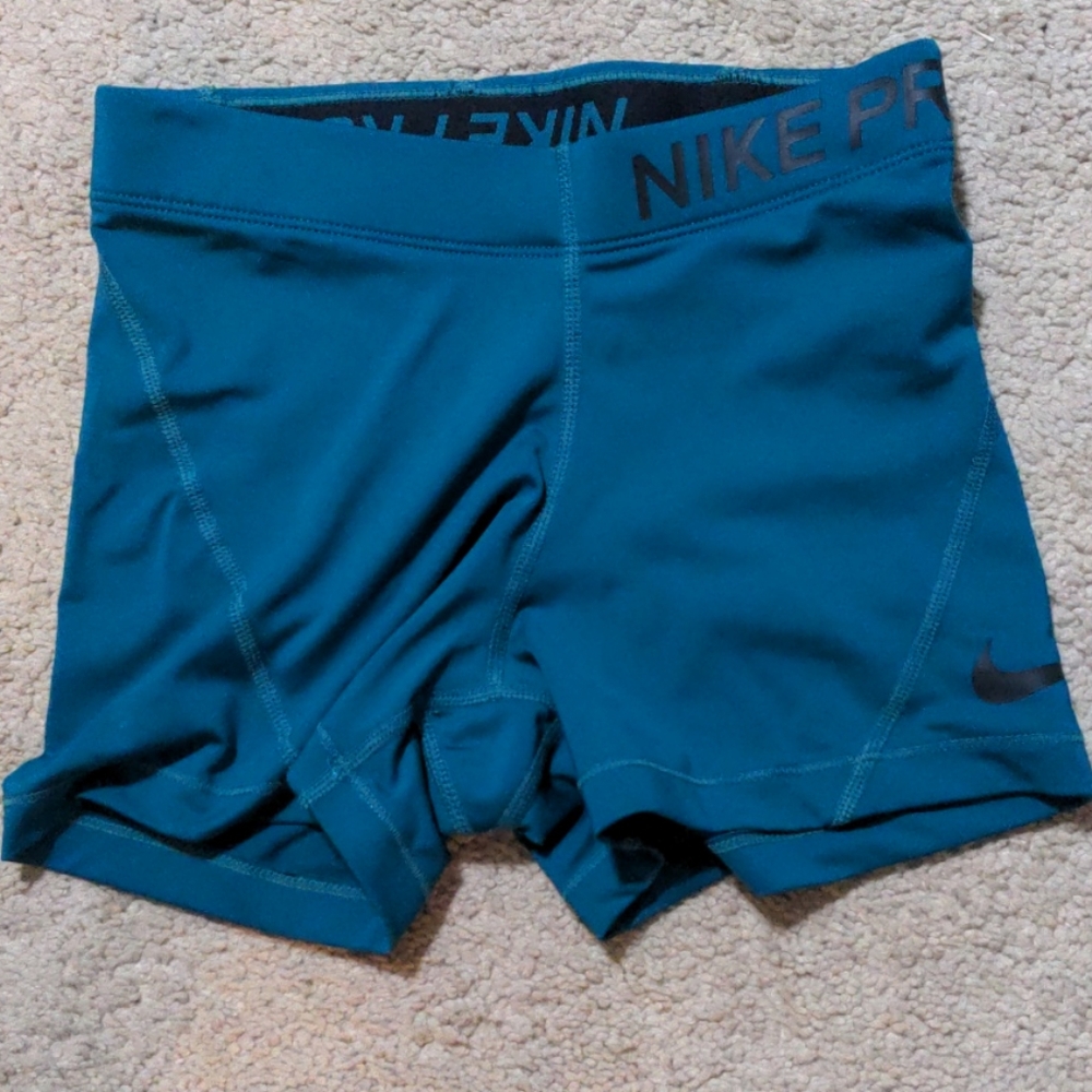 Green/teal Nike pro shorts